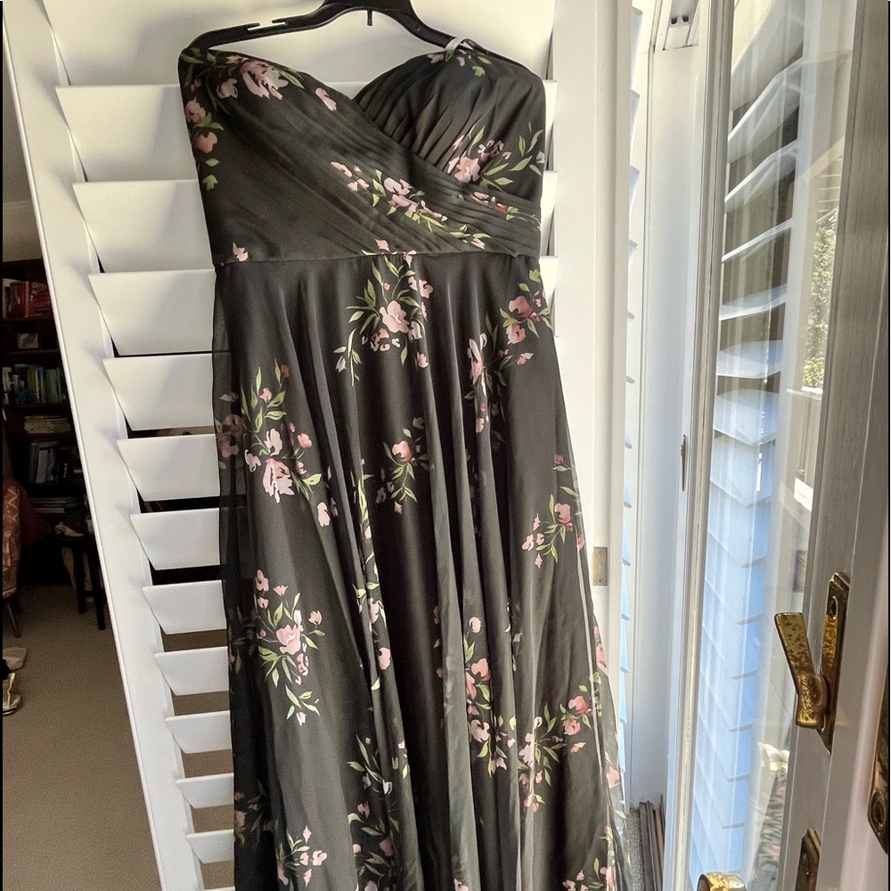 This is a floor length strapless gown from Jenny Yoo collection